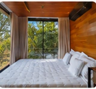 Quarto com vista para a natureza